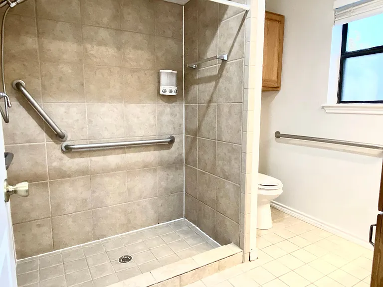 Restroom with walk in shower