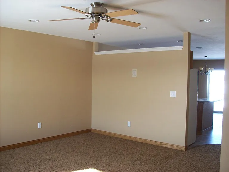 living room going into the kitchen area.