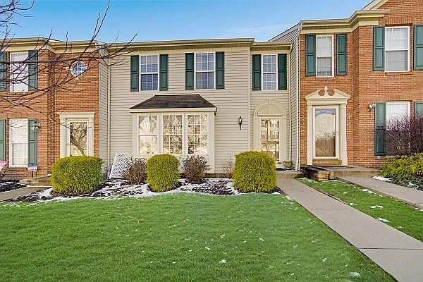 Beautifully maintained and updated town home in the Villas of Woodcreek Community.