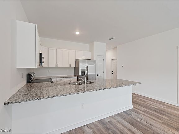 5th image of 2206/2208 Leda Ave S