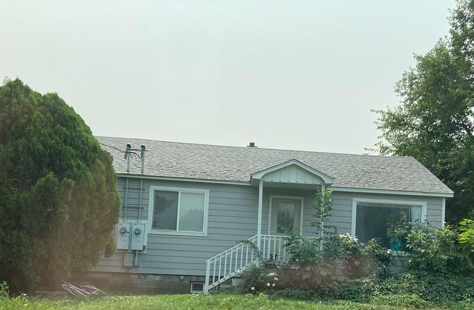 Separate entrance for basement is in the back