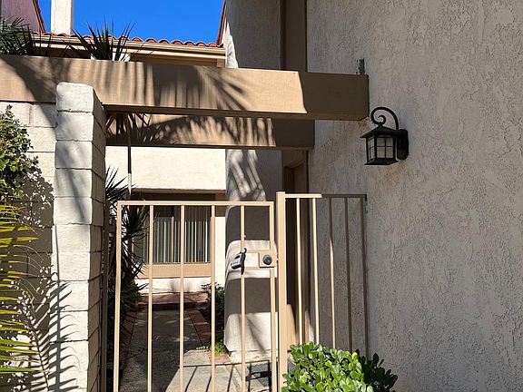 Private gated entry at front of home