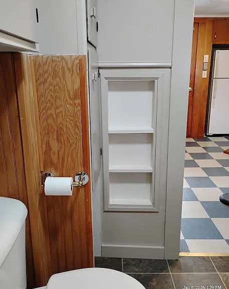 Wall has built in shelves - so convenient! Store and Grab what you need!