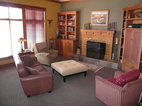 Living Room with wood-burning fireplace