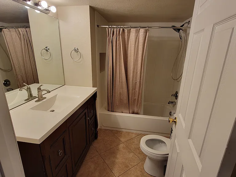 6411 Raleigh St — Photo 15