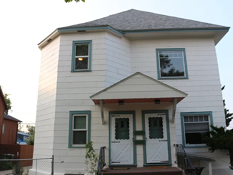 Unit is top floor, front door on left.