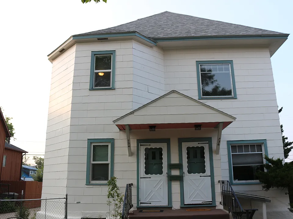 Unit is top floor, front door on left.