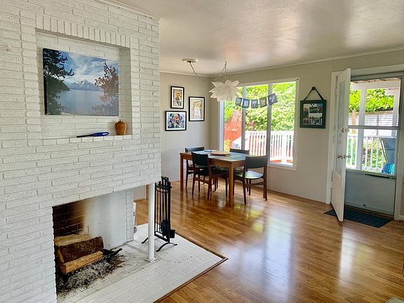 Dining Room, fireplace, back door viewed from living room