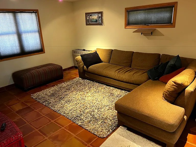 Den with 1/2 bath and door to back patio, washer & dryer in closet
