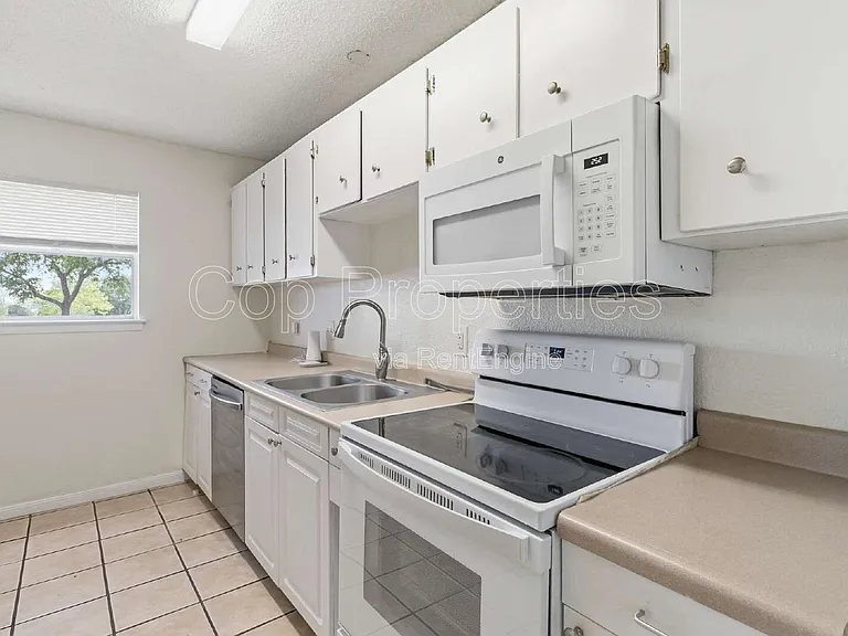 4813 Fred May Dr — Photo 11