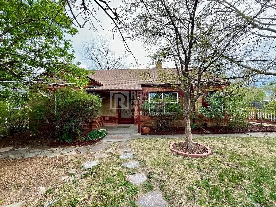 Charming 3-Bedroom Denver Home with Sunroom & Attached Garage — Photo 1