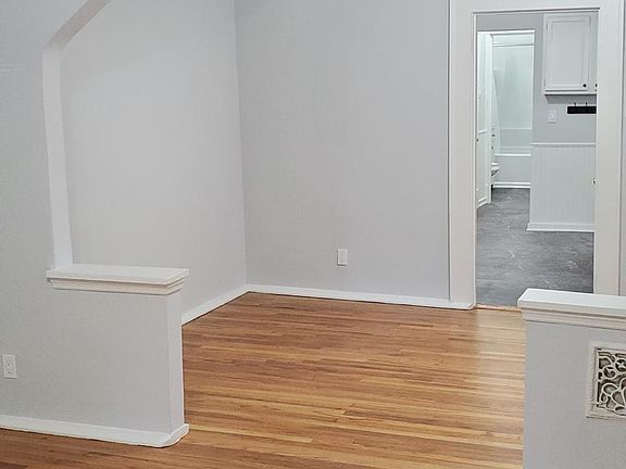Another view of the front 2 rooms with connecting archway.