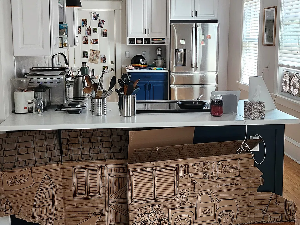 Eat in kitchen with countertop for barstools.