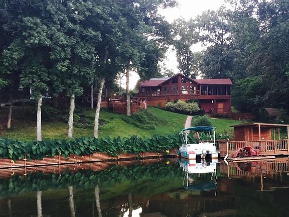 Snow Lake Dream Home : Beautiful landscaping, wooded lot with gorgeous home