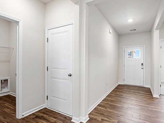 welcome home! laundry and coat closet