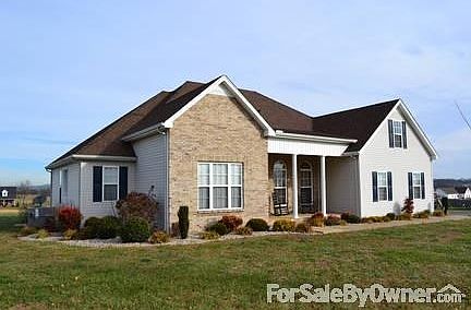 House Front
						:
						Large porch. Landscaping.
