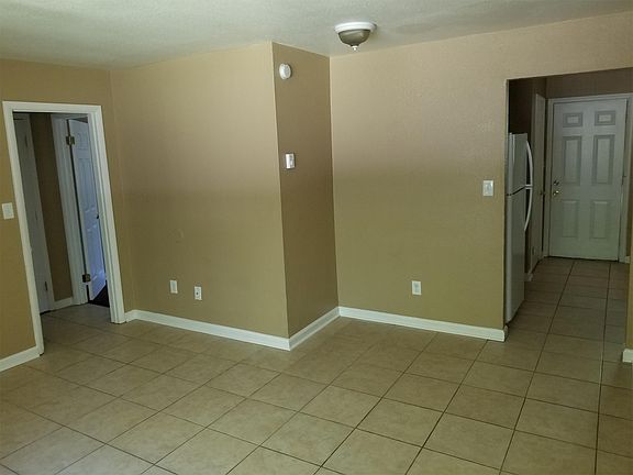 Living Room with View of Kitchen