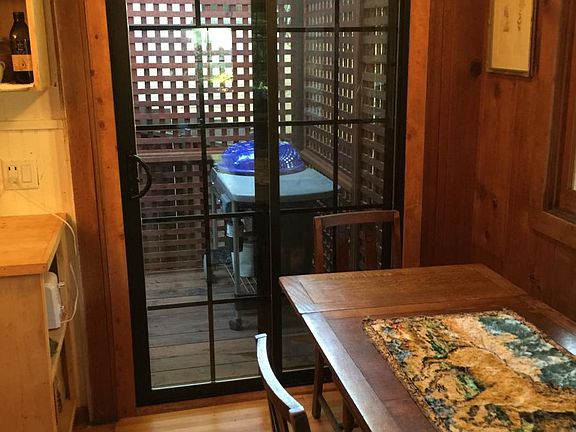 dining area off kitchen and deck