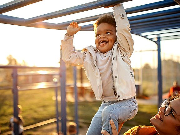 Child playing at Laurel at Blossom Rock