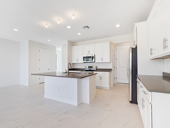 Great room adjacent to kitchen