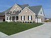 Front of Home Showing 3 car garage