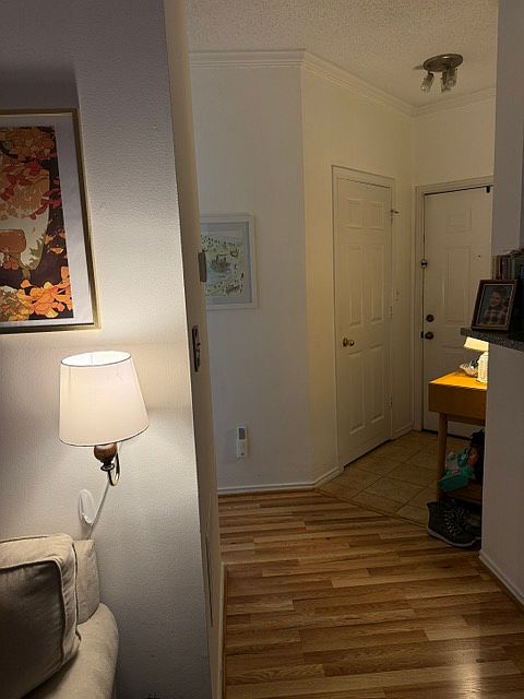 The front door has a nice tiled entryway. This also features a large hallway closet behind the door to the left.