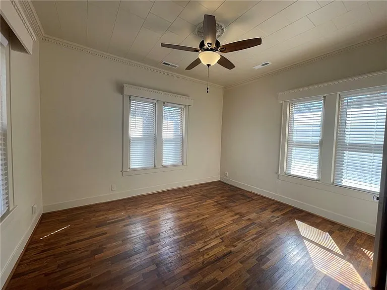 This First Bedroom Has 6 Windows.
