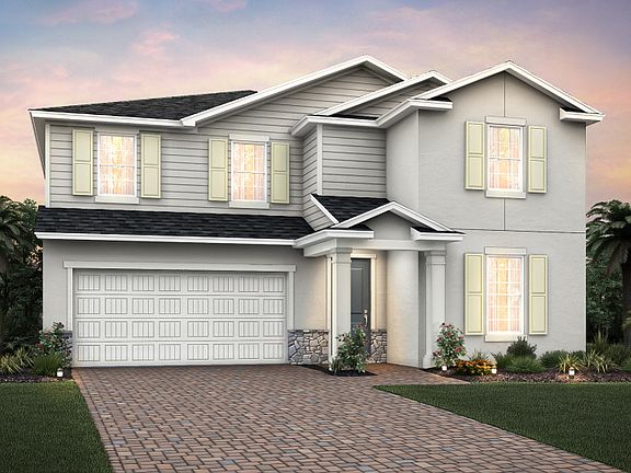 Home Exterior FM2C with shingle roof and decorative stone detail