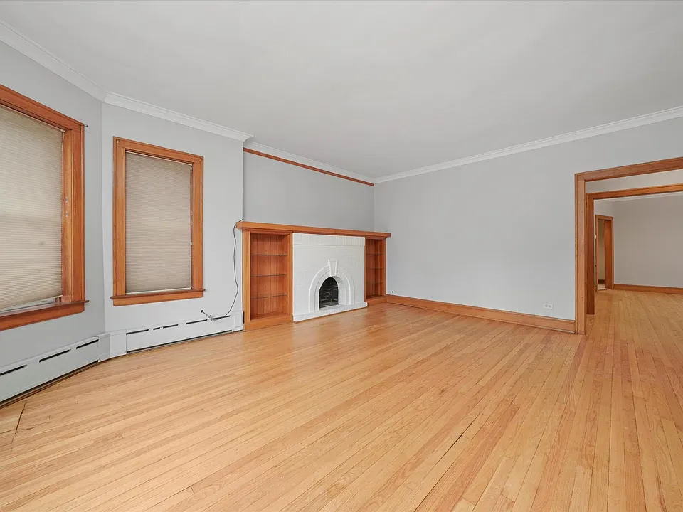 Large livingroom with newly refinished hardwood floors