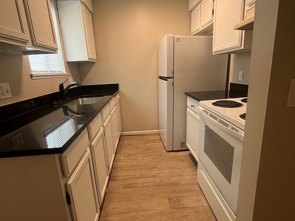 Cozy kitchen with updated cabinets and countertops.