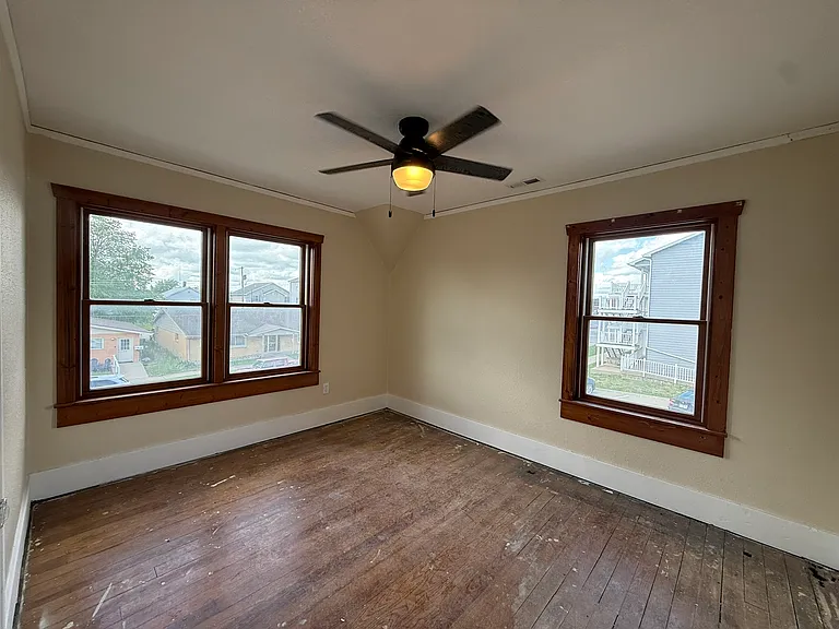 BR4 - upstairs. Hardwood floors are being refinished.