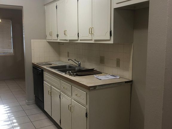 Kitchen from back hallway to bedrooms