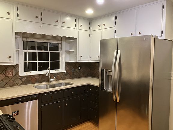 Kitchen and window to rear deck and yard