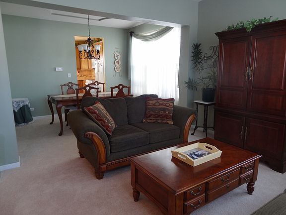 Formal living room open to the dining room.