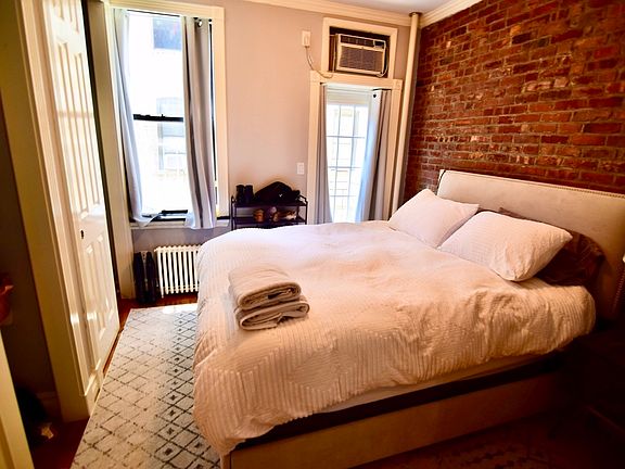 2nd image of 381 E 10th St APT 3A