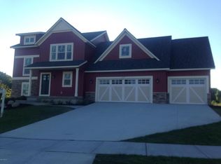 155 Hightower Dr NE, Rockford, MI 49341