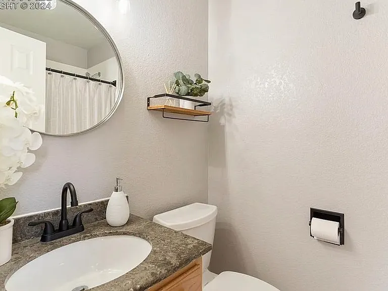 Master bath (shower only, no tub).