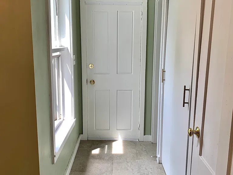 Back door, only few steps from 2 parking spaces
