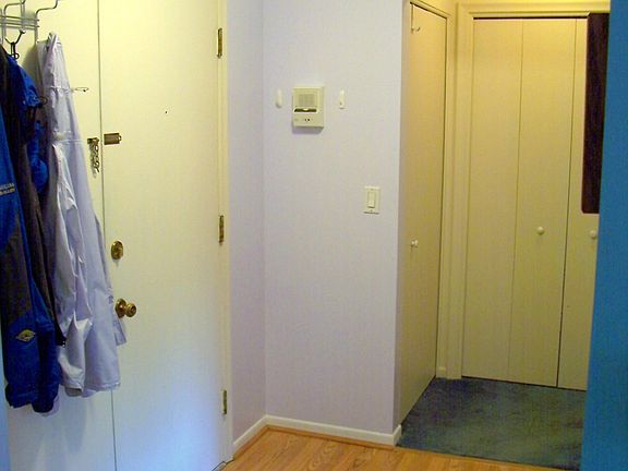 Entryway (kitchen entrance on right, hall to bedroom ahead)