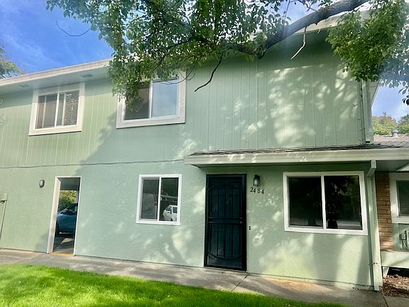 Entrance that is close to the carport, laundry room and storage closet