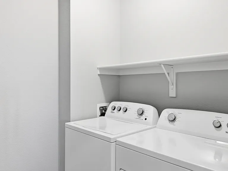 Simplify your routine with a washer and dryer inside your home.