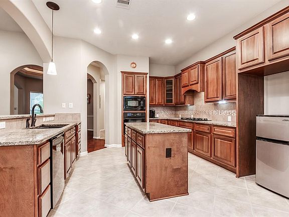 Kitchen with nice island open to living room.