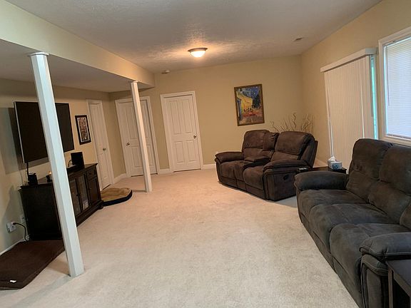 Lots of space for whatever your heart might desire. Access to the patio is to the right but it seems that everyone enjoys the balcony more because it's closer to FOOD.