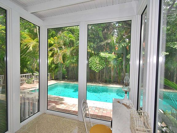 downstairs bedroom with great picture window to garden