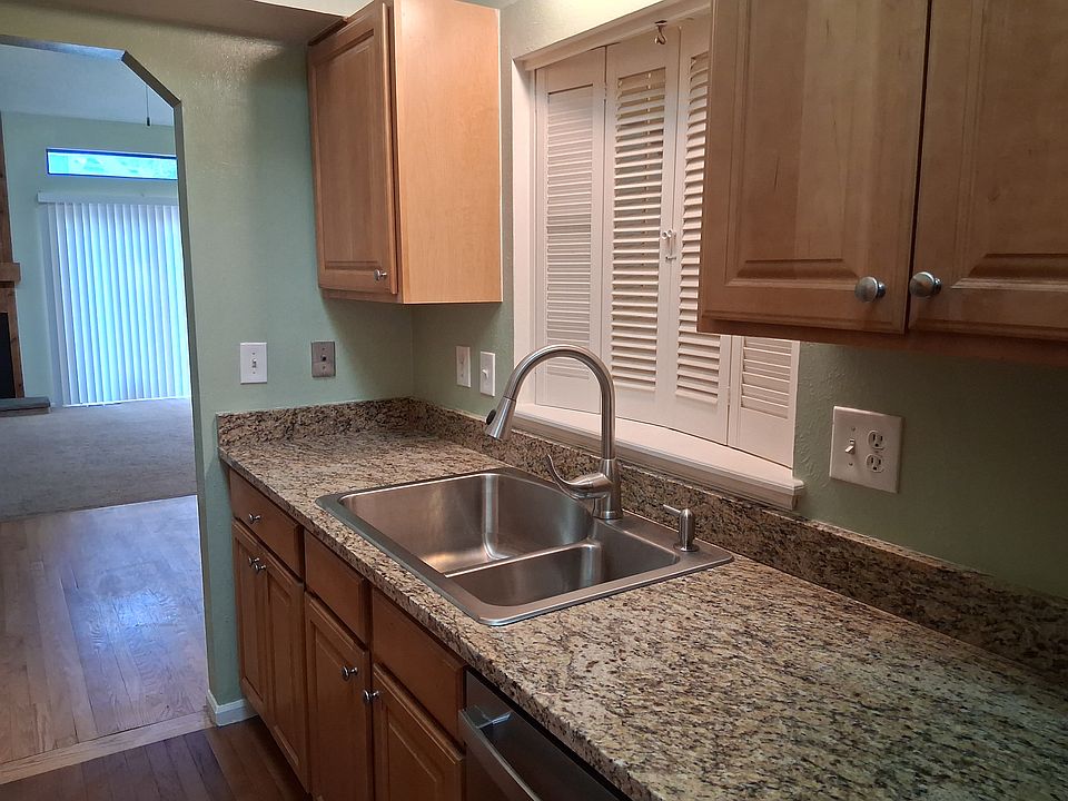 New SS sink and modern faucet