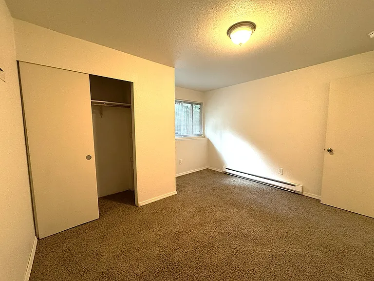 Bedroom with baseboard heating