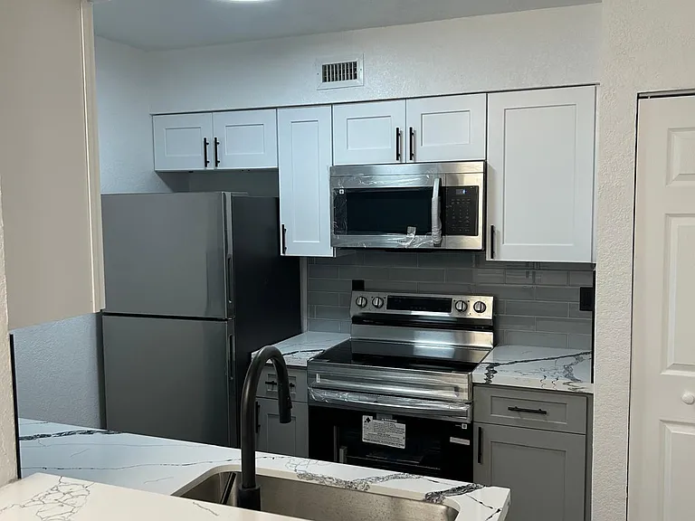 2820 N Oakland Forest Dr #106 — Photo 6
