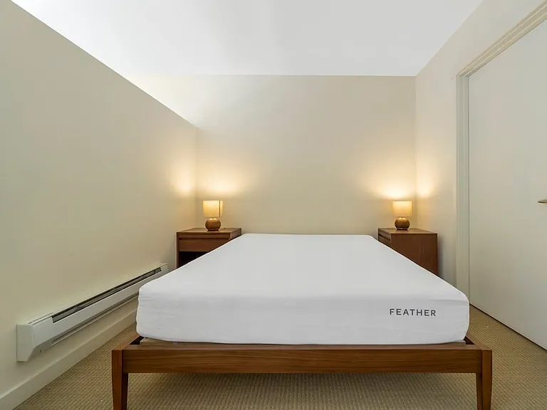 Furnished+ apartment homes feature queen bed with mattress, dresser, nightstands, and lamps (Representative Image exact items and style of furnishings may vary)
