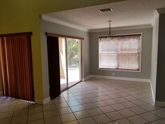 DINING ROOM & DOOR TO  PATIO