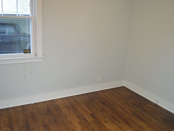 Bedroom 1 w/ sand and finished floors